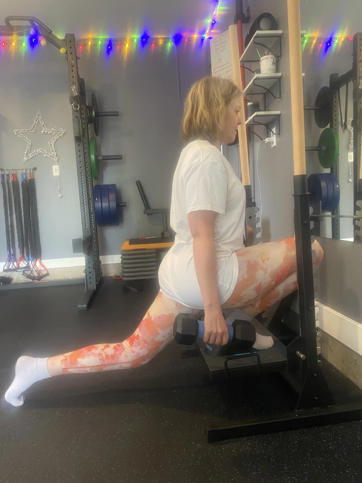 A knees-over-toes split squat at No Easy Feet in Portland